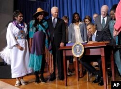 President Barack Obama signs Violence Against Women Act, Interior Department, Washington, March 7, 2013.