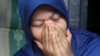 Reaksi Baiq Nuril Maknun, yang mengungkap pelecehan seksual atasannya, saat dijatuhi hukuman penjara karena dianggap melanggar UU ITE, di Mataram, Lombok, 16 November 2018