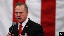 FILE - U.S. Senate candidate Roy Moore speaks at a campaign rally in Midland City, Ala., Dec. 11, 2017. 