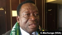 Victor Matemadanda, the war veterans' secretary, is among those who accuse the US of interference in Zimbabwean politics. In the photo, (08/21/2018) he talks to reporters in Harare. 