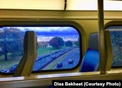 A Virginia Railway Express train crosses a bridge in Crystal City, Arlington over George Washington Memorial Parkway to Washington D.C., Nov. 14, 2018. Amazon chose Crystal City, Virginia, for one of its headquarters locations. (Photo: Diaa Bekheet)