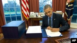 Le président Barack Obama dans son bureau à la Maison Blanche, à Washington DC, Etats-Unis.