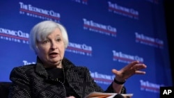 FILE - Federal Reserve Chair Janet Yellen at the Economics Club of Washington, Dec. 2, 2015. Yellen indicated that the U.S. economy is on track for an interest rate hike this month, but the Fed will need to review incoming data before making a final decision.