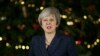 La Première ministre britannique Theresa May devant le Downing Street, à Londres, le mercredi 12 décembre 2018. (AP Photo / Tim Ireland) 