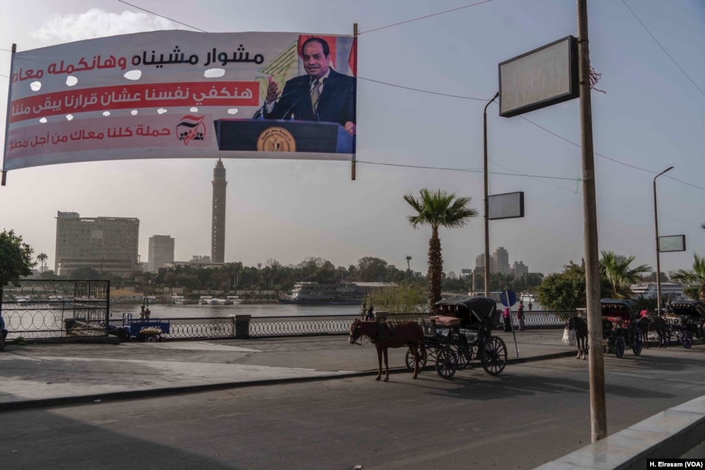 A campaign banner along the Nile urges voters to re-elect President Sissi in next month&#39;s elections. Ethiopia embarked on construction of the gigantic dam as Egypt was embroiled in the political turmoil of the 2011 revolution that toppled longtime ruler Hosni Mubarak.