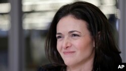 FILE - Facebook chief operating officer Sheryl Sandberg is photographed at the company's headquarters in Menlo Park, California, Feb. 3, 2015. Some women, and men, worry that the same climate that's emboldening women to speak up about harassment could backfire by making some men wary of female colleagues. Sandberg recently wrote that she hoped the outcry over misconduct doesn't "have the unintended consequence of holding women back." 