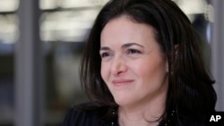 FILE - In a Feb. 3, 2015, file photo, Facebook chief operating officer Sheryl Sandberg is photographed at the company's headquarters in Menlo Park, California. Some women, and men, worry that the same climate that's emboldening women to speak up about har