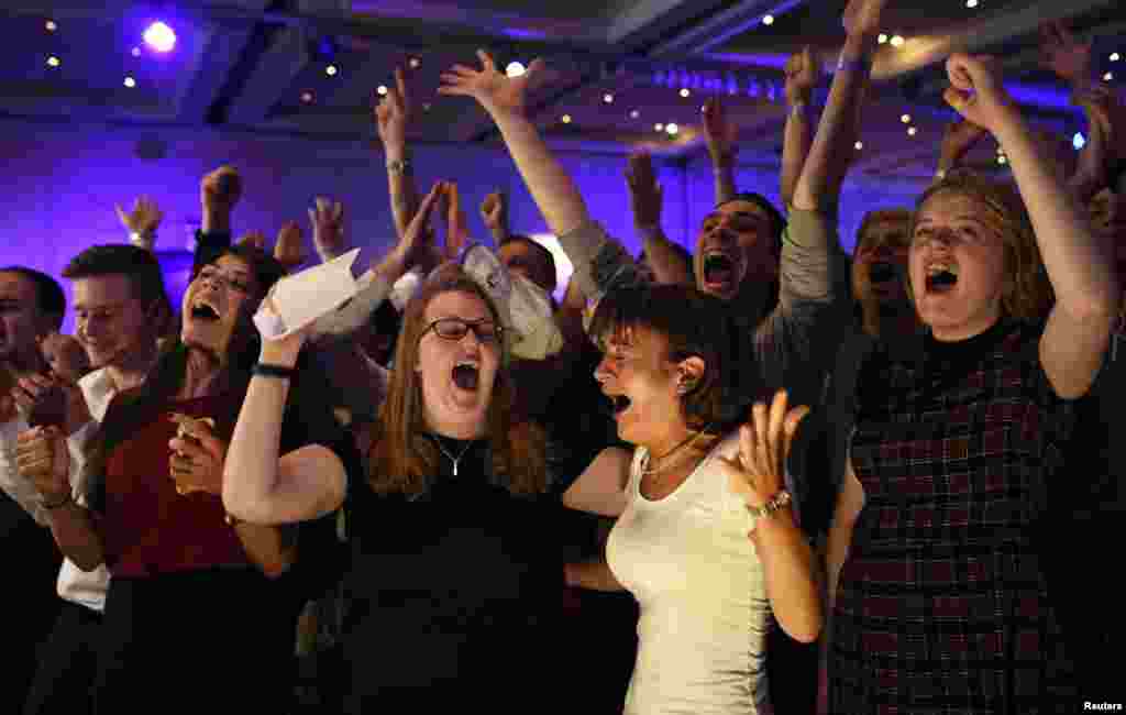 Supporters from the "No" Campaign react to a declaration in their favor, at the Better Together Campaign headquarters in Glasgow, Scotland. Scotland voted on Thursday on whether to stay within the United Kingdom or end the 307-year-old union. 