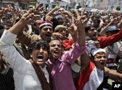 Anti-government protesters shout slogans during a demonstration demanding the resignation of Yemeni President Ali Abdullah Saleh, in Sana'a, May 7, 2011