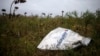 MH17 Victim Found Wearing Oxygen Mask