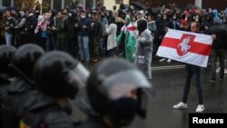 Belarusian opposition supporters hold a rally in Minsk