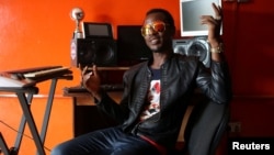 Music producer Keynote Adeosun poses for a picture in his recording studio in the Festac district of Lagos, Nigeria, May 17, 2016. 