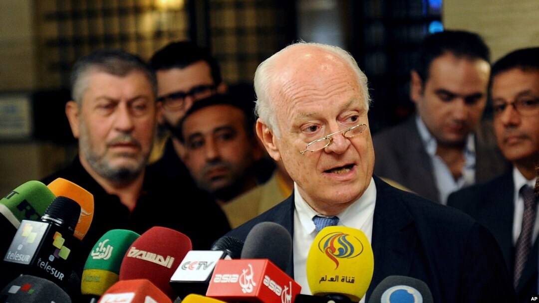 In this photo released by the Syrian official news agency SANA, United Nations special envoy to Syria Staffan de Mistura, speaks during a press conference in Damascus, Syria, Tuesday, Nov. 11, 2014.