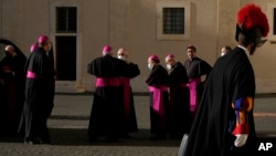 FILE - Spanish bishops arrive in the San Damaso courtyard at the Vatican for an 'ad limina apostolurum' meeting with Pope Francis, Dec. 16, 2021. 