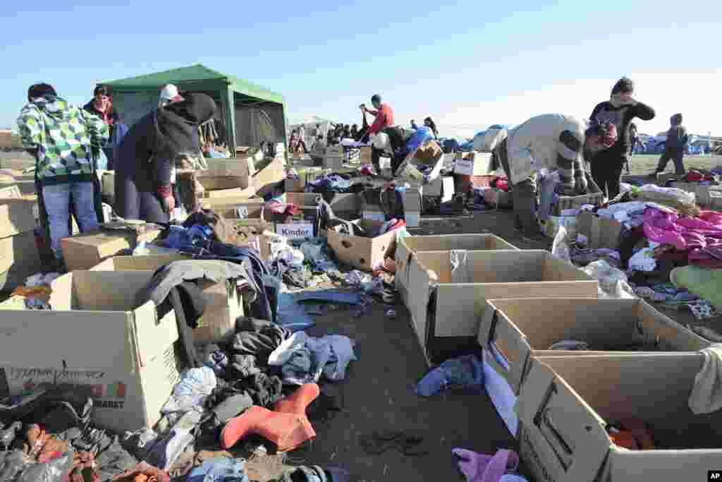 There are charity organizations in the reception center near the border village of Roszke, 180 kms southeast of Budapest, Hungary.