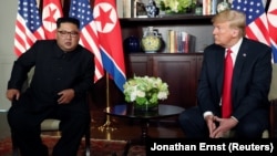 SINGAPORE -- U.S. President Donald Trump and North Korea's leader Kim Jong Un meet in a one-on-one bilateral session at the start of their summit at the Capella Hotel on the resort island of Sentosa, Singapore June 12, 2018