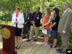 U.S. Sen. Amy Klobuchar speaks about price hikes for EpiPens, the emergency drug injectors for severe allergic reactions, at Children's Hospital, Aug. 24, 2016, in Minneapolis. Klobuchar's 21-year-old daughter carries an EpiPen because of severe nut allergies, is one of several members of Congress demanding more information on why EpiPen prices have soared