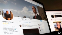 A Twitter page of Chinese exiles businessman Guo Wengui is seen on a computer screen in Beijing. Escalating efforts to repatriate one of its most wanted exiles, China's ruling Communist Party has opened a police investigation on a new allegation, r...