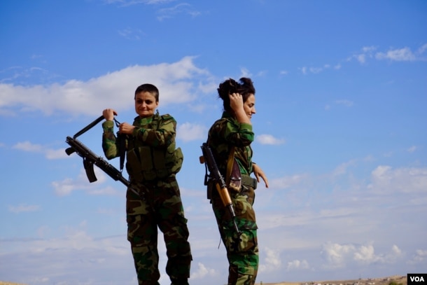 Kani, 30, left, was nearly killed early in the Mosul offensive when a suicide bomber exploded a car packed with explosives 60 meters from her. Seventeen peshmerga fighters were killed in the blast. Nov. 2, 2016. (J. Dettmer/VOA)