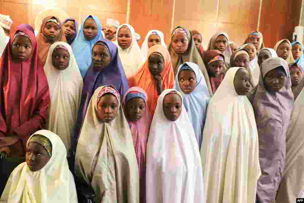 Released Nigerian school girls who were kidnapped from their school in Dapchi, in the northeastern state of Yobe, wait to meet the Nigerian president at the Presidential Villa in Abuja.