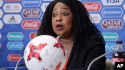 FILE - In this June 16, 2017, photo, FIFA secretary general Fatma Samoura talks to media during a news conference at St. Petersburg Stadium, Russia.