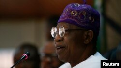 Minister of Information Lai Mohammed briefs the media on the town of Bama liberated from Boko Haram, during a news conference in Abuja, Nigeria, Dec. 8, 2015. 