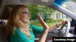 Minivan-driving Democratic candidate Jennifer Wexton in a screenshot from a campaign television ad.