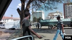 Water cannons and riot police patrol in streets of Harare looking for possible pockets of resistance after protestors were violently dispersed by Zimbabwean police, Harare, Zimbabwe, Aug. 17, 2016. (S. Mhofu/VOA)