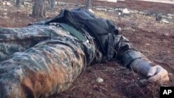 This image posted online by the Ahrar al-Sham militant group purports to show a dead Syrian soldier in a government-held neighborhood of Aleppo, Syria. The Syrian military has reportedly called in reinforcements for a rebel counteroffensive in the city.