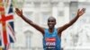 FILE - Eliud Kipchoge of Kenya wins the men's race in the 35th London Marathon, April 26, 2015. He also won the race the following year.