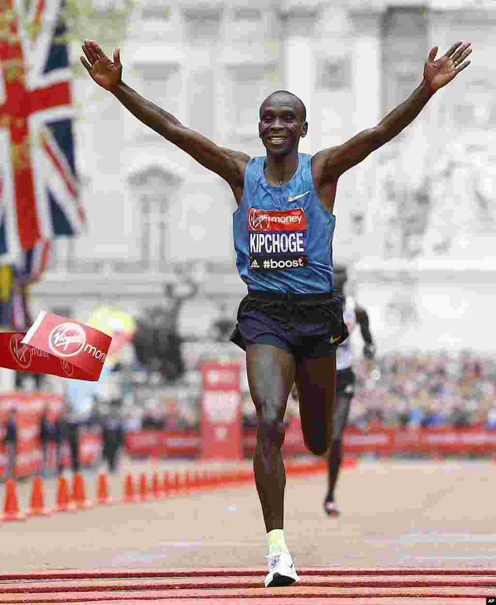 Eliud Kipchoge of Kenya wins the Men's race in the 35th London Marathon.