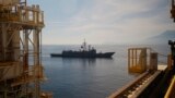 FILE - A Turkish Navy frigate escorts Turkey's new drillship 'Conquerer' off the coast of Antalya, southern Turkey.