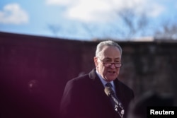 FILE - U.S. Senator Chuck Schumer addresses the crowd during a protest against President Donald Trump's travel ban, in New York City, Jan. 29, 2017.