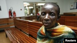 Jolly Nyamigisha, 40, a Ugandan woman living with HIV/AIDS waits to receive antiretroviral drugs from the Infectious Disease Institute (IDI) at the Uganda referral hospital, Mulago, near the capital Kampala, (File).