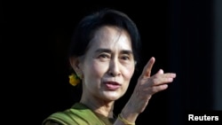FILE - Aung San Suu Kyi