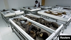 FILE - A display of Chinchorro mummies at the San Miguel Museum in Aricay, Chile, in 2005.