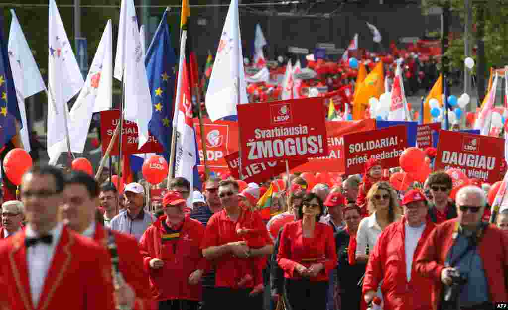 Members and supporters of the Lithuanian social democratic party and trade unionists take part in a May Day parade in Vilnius.