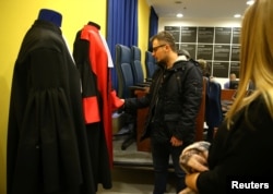 Students are seen at the original courtroom of the United Nations International Criminal Tribunal for the former Yugoslavia, as a part of their education, in Sarajevo City Hall, Bosnia and Herzegovina, Dec. 7, 2018.