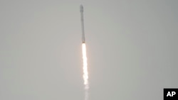 The SpaceX Falcon 9 rocket is seen as it launches with the Jason-3 spacecraft onboard, Sunday, Jan. 17, 2016, from Vandenberg Air Force Base in California.