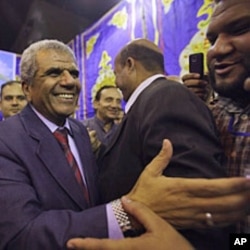 Sobhi Saleh (l), a senior member of the Muslim Brotherhood and former member of parliament, is surrounded by supporters in Cairo, Egypt, May 12, 2011