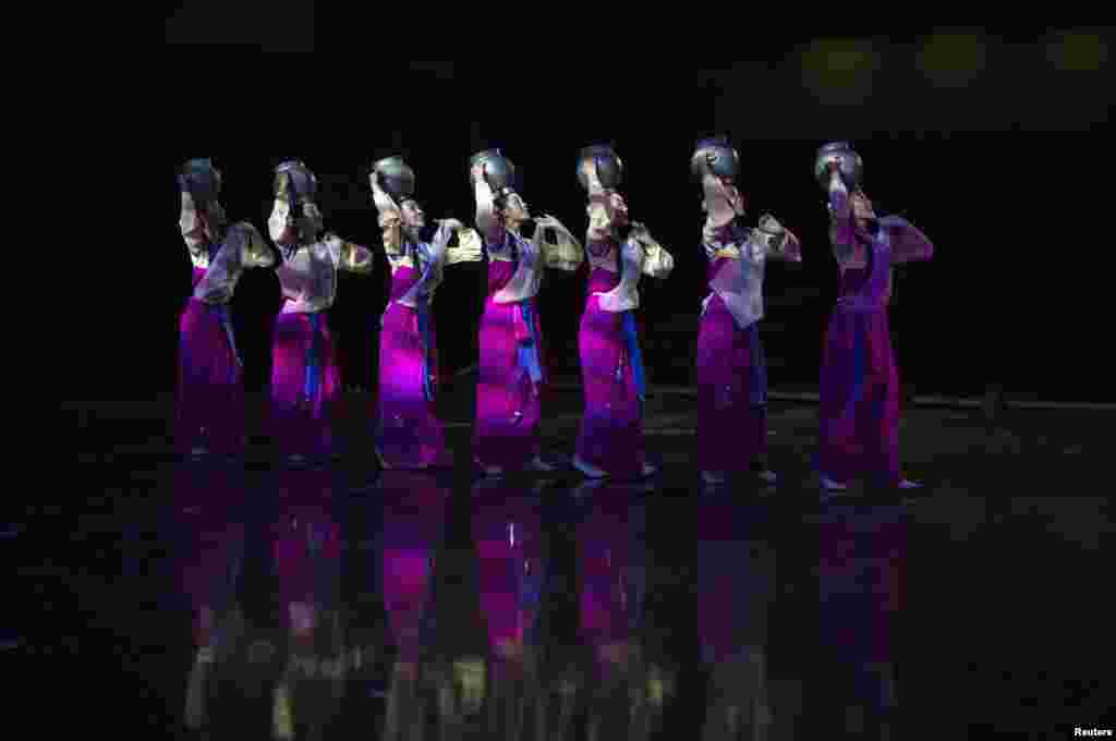North Korean artists from Pyongyang rehearse for an evening dancing performance called &quot;Azalea&quot; during the 13th Asian Arts Festival in Kunming, Yunnan province, China. 