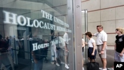 FILE - People line to enter the U.S. Holocaust Memorial Museum in Washington.