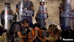 Greece Approves New Austerity Protests
