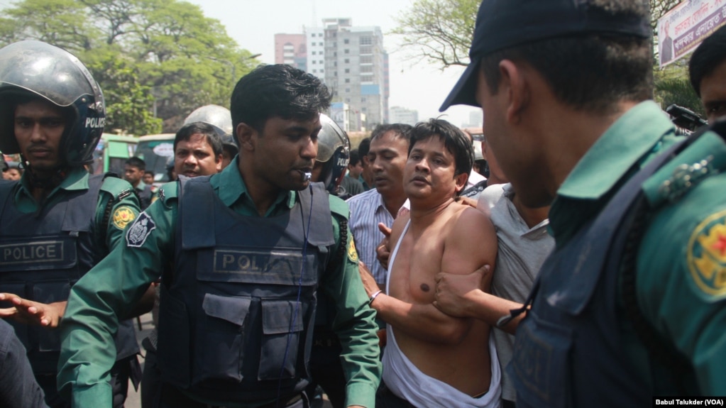 An opposition BNP activist is being arrested by policemen in Dhaka. In 2018, thousands of opposition leaders and activists were arrested in Bangladesh on allegedly trumped up cases of political violence.