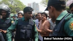 An opposition BNP activist is being arrested by policemen in Dhaka. In 2018, thousands of opposition leaders and activists were arrested in Bangladesh on allegedly trumped up cases of political violence.