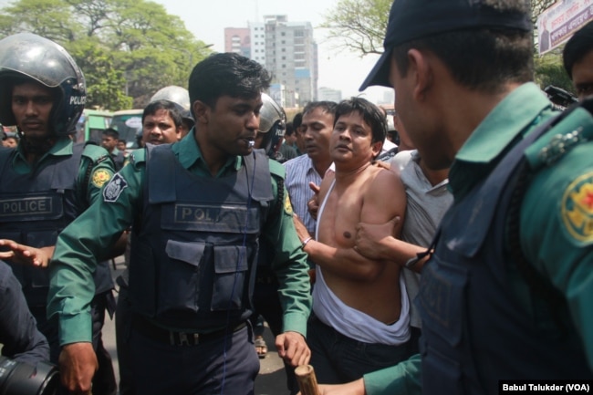 An opposition BNP activist is being arrested by policemen in Dhaka. In 2018, thousands of opposition leaders and activists were arrested in Bangladesh on allegedly trumped up cases of political violence.