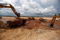 FILE - The airport construction site is seen in the area developed by China company Union Development Group at Botum Sakor in Koh Kong province, Cambodia, in 2018.