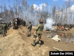 Pakistan captures Indian pilot after shooting down two Indian jets. Site of crash in Indian administered Kashmir