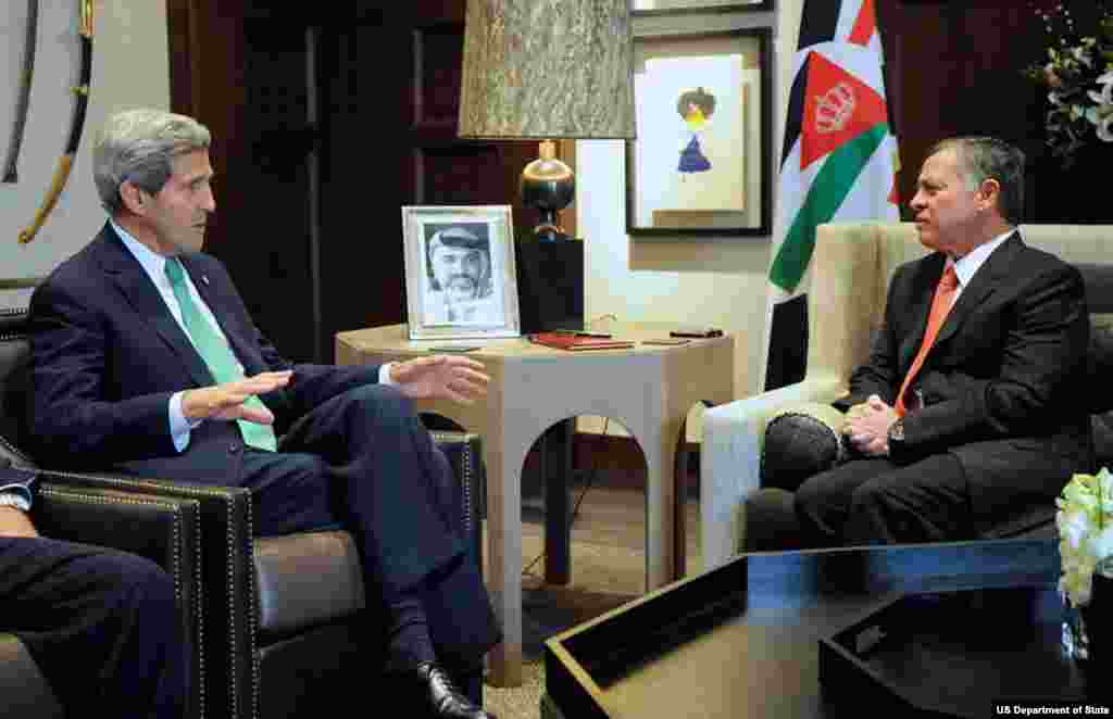 U.S. Secretary of State John Kerry speaks with King Abdullah II of Jordan at Al Hummar Palace in Amman, Jordan, at the outset of talks on November 7, 2013, that focused on Middle East issues.