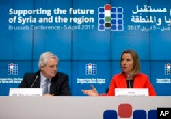 European Union foreign policy chief Federica Mogherini, right, and U.N. Office for the Coordination of Humanitarian Affairs Greg O'Brien, left, address a media conference at an EU Syria conference at the Europa building in Brussels, Belgium, April 5, 2017.